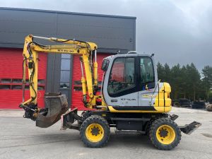 New Holland MH 2.6 / Engcon, 3 kauhaa