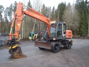 Hitachi ZX 140 W-3 pyörittäjällä