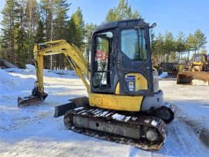 Komatsu PC55MR-3, Kallistuva liitin, Tasauskauha
